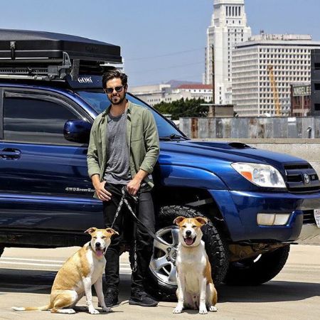 Chris with his two pet dogs